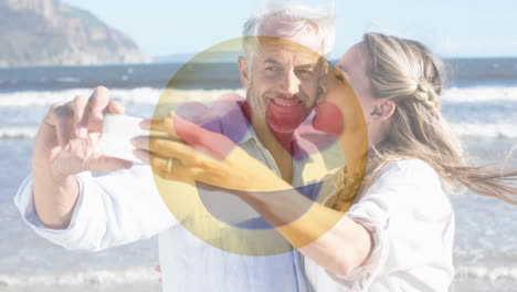 happy couple taking selfie on the beach with love smiley for valentine day