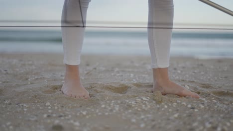 woman's feet on a beach