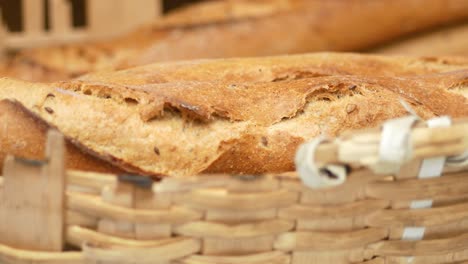 fresh baguettes in a woven basket