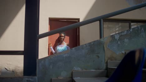 portrait of a young black woman in a mesh top