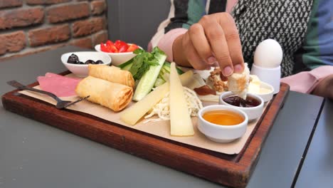 traditional turkish breakfast with cheese, bread, eggs, and more