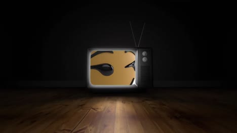Digital-animation-of-smirk-face-emoji-on-television-screen-against-grey-background