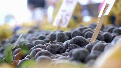 plums at a farmer's market