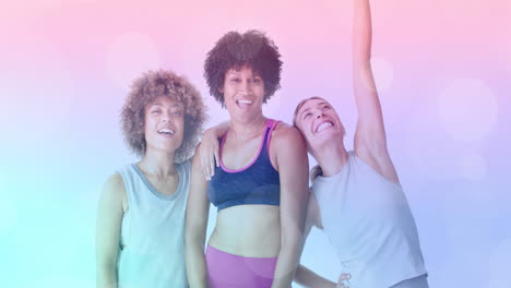 smiling in workout attire, women with colorful bokeh animation in background