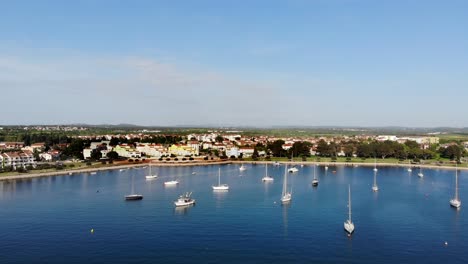 aerial: flying into the a little harbor