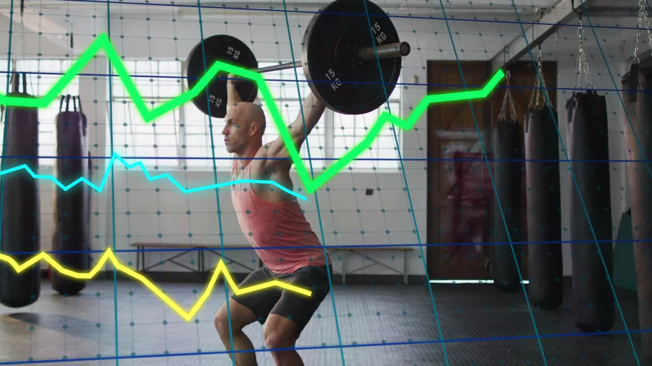 Man shifting stance lowering then rising to stand in overhead squat graphs logging form for fitness