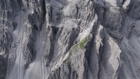 Close-up-aerial-of-Dolomites'-steep-rocky-cliffs