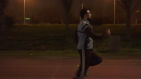 tracking shot of person increasing his speed while running in salamanca city, spain