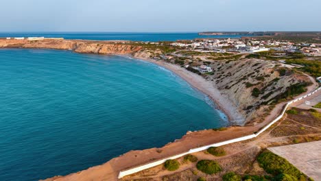 captivating aerial view of coastline and village in portugal
