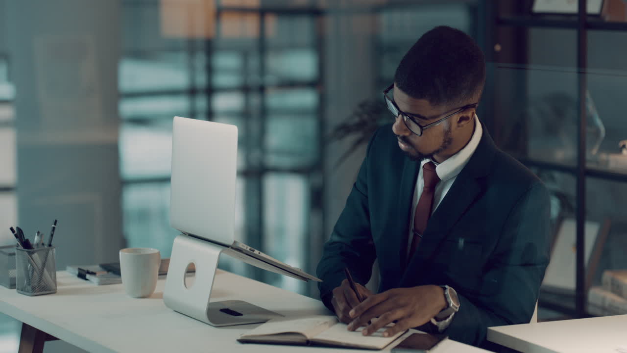 a young businessman using a laptop