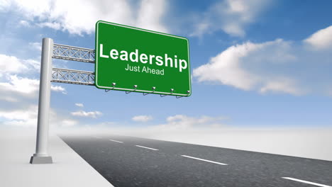 leadership sign over open road