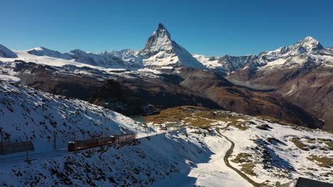 matterhorn mountain and gornergrat train in winter at sunset