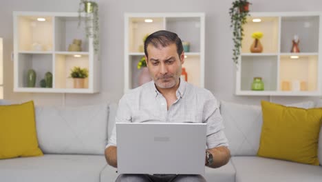 Man-making-video-call-on-laptop.