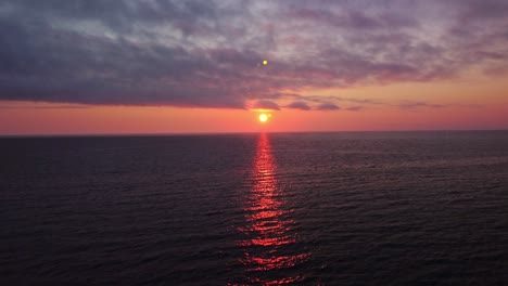 sunset and horizon of the sun over the lake michigan, milwaukee