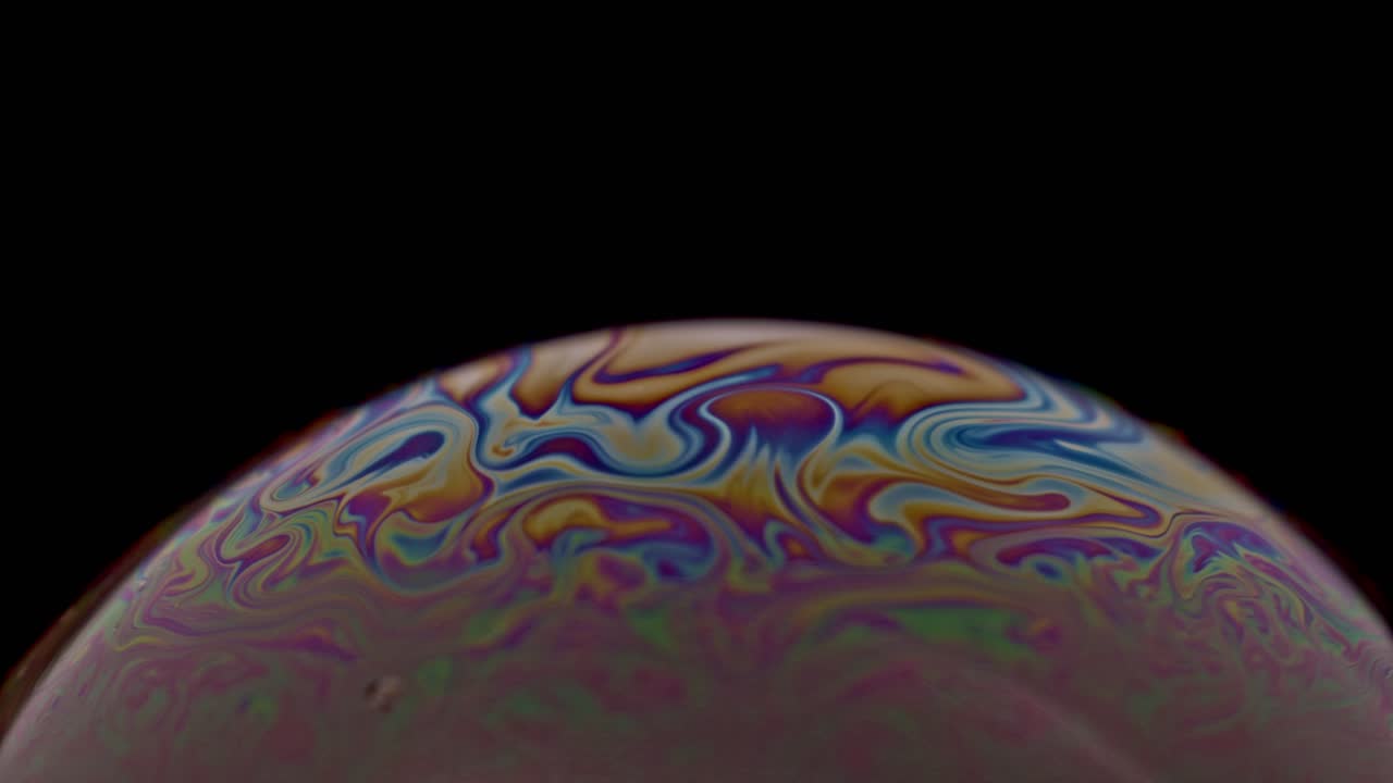 Closeup of a bubble with colors and animation for example for backgrounds