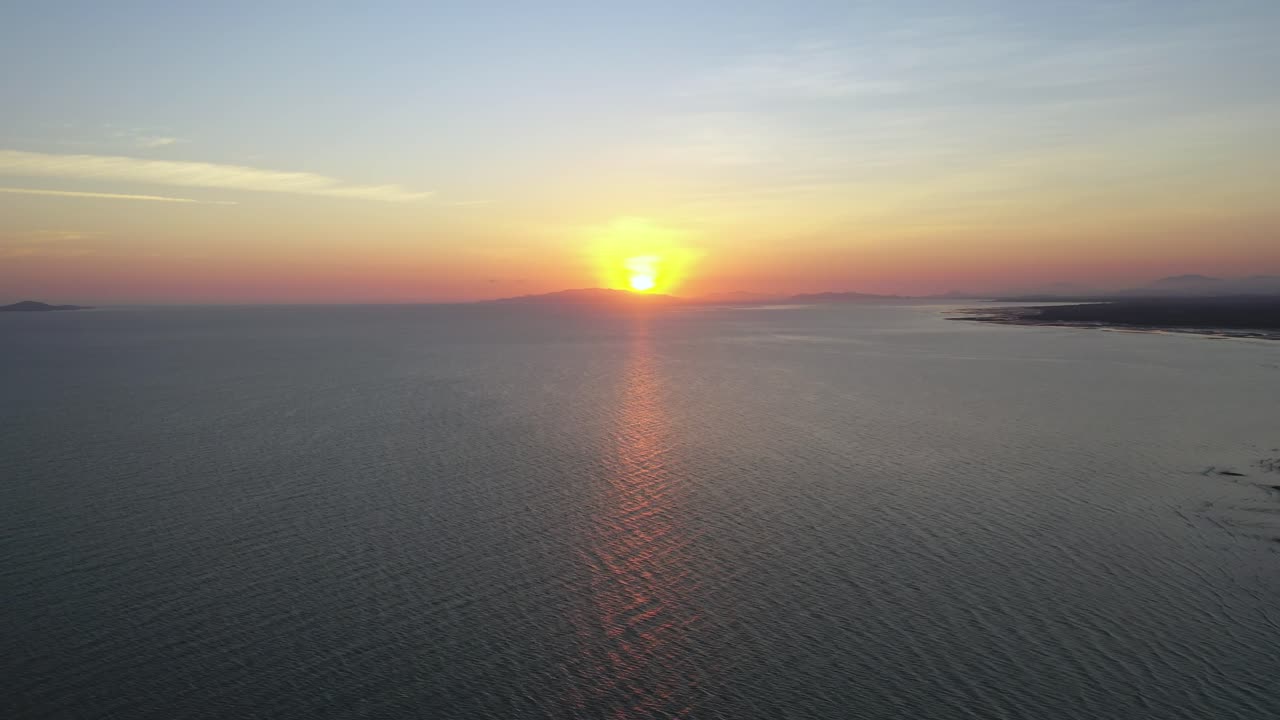 Static drone footage of sunrise over Coral Sea