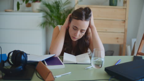 Sad-Worried-Female-Student-Studying-at-Desk