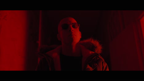man in red light