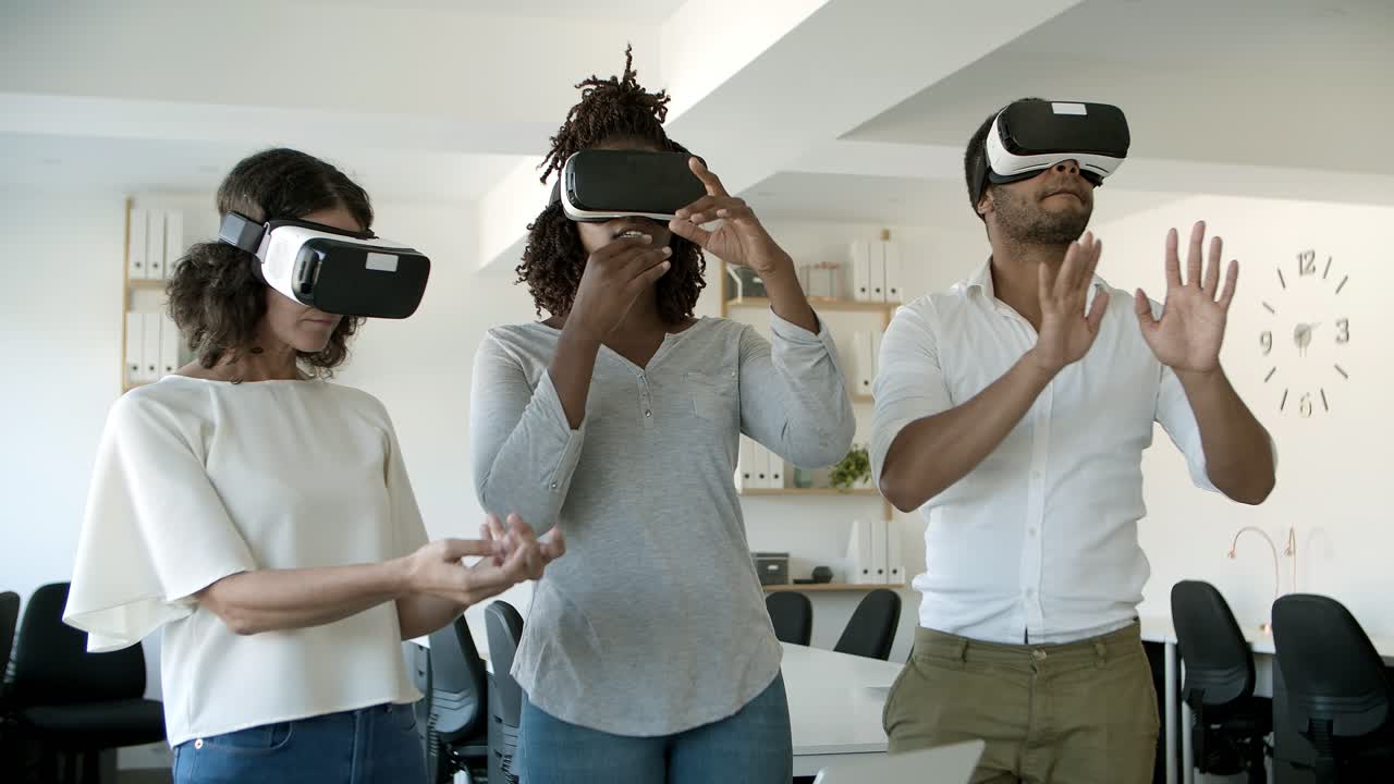 Front view of three users with VR headsets