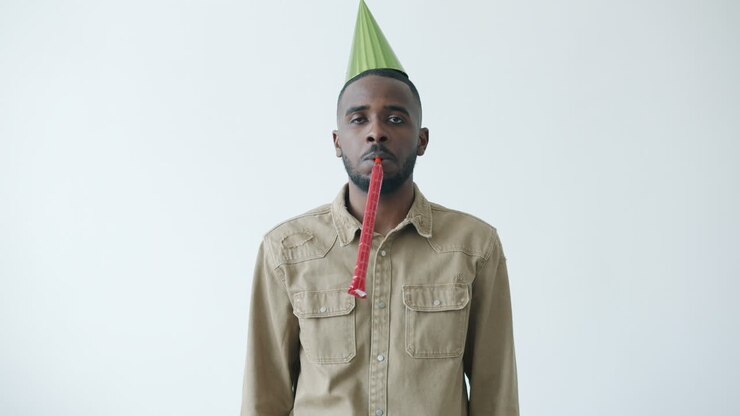 Man with Party Hat and Horn