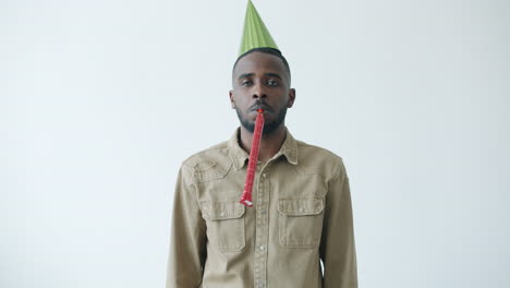 Man with Party Hat and Horn