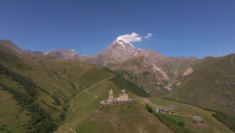 forward drone shot above gergeti trinity church