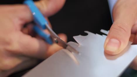 young eco jewelry maker creating artwork in her atelier