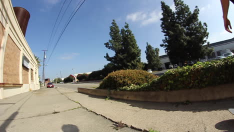 old school skating wide angle lens footage with skateboard on the street