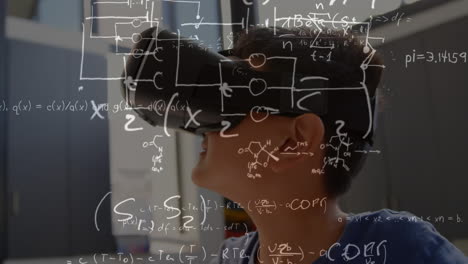 Animation of over equations over schoolboy wearing vr headset