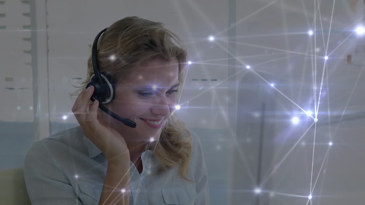 Animation of network of connections over businesswoman wearing phone headset