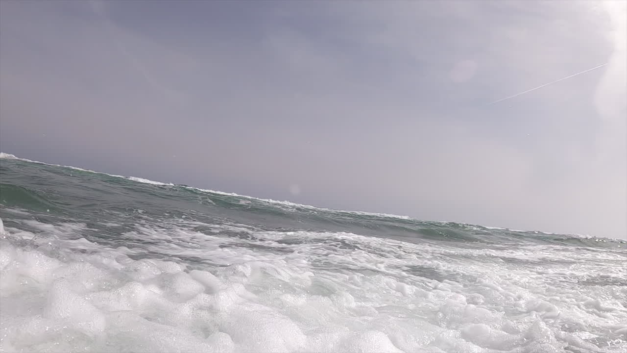 View of the waves and bubbles of the sea