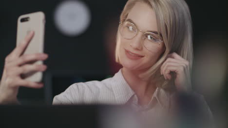 Woman-taking-photo-at-workplace