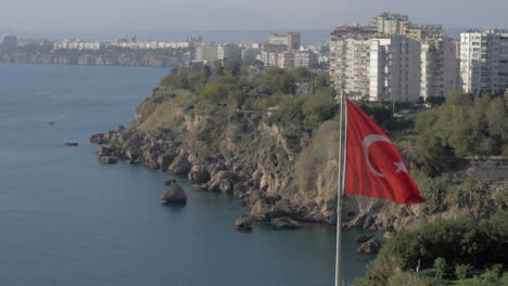 antalya coast and turkish flag