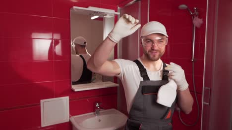 a professional toilet in the red bathroom is pointing up