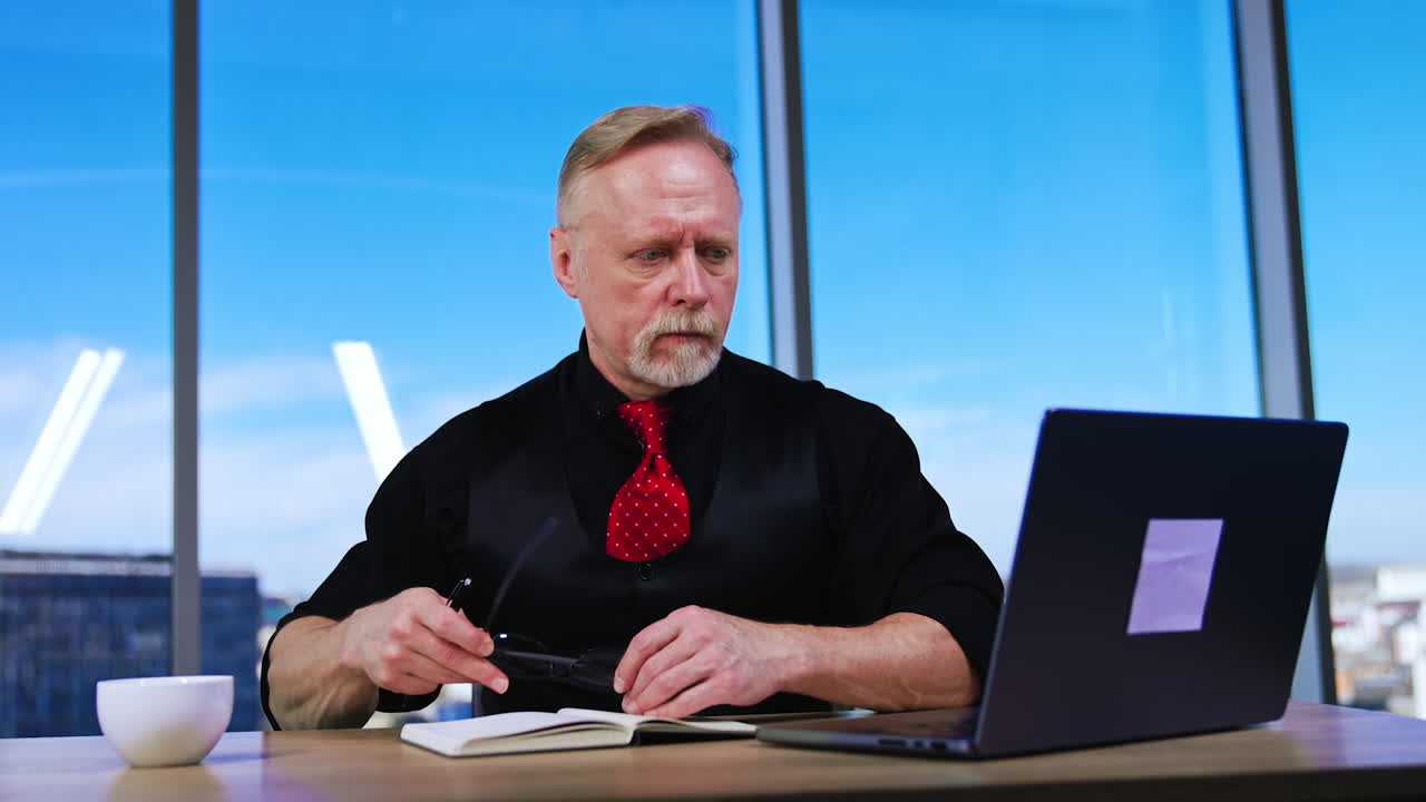 Mature middle age in casual cloth. Stylish handsome businessman working in the office.