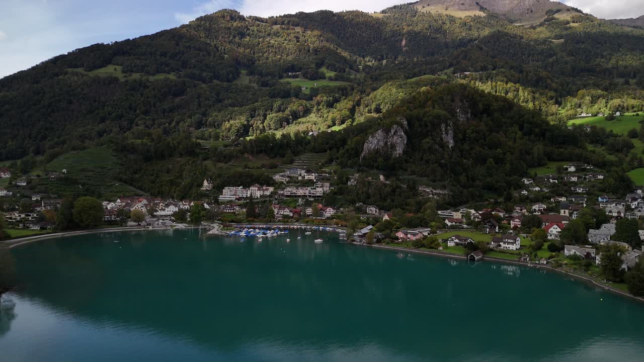 Stunning Aerial View of a Lakeside Village in the Swiss Alps