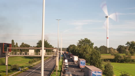 time lapse of traffic jam highway with accident in front, zoom out view