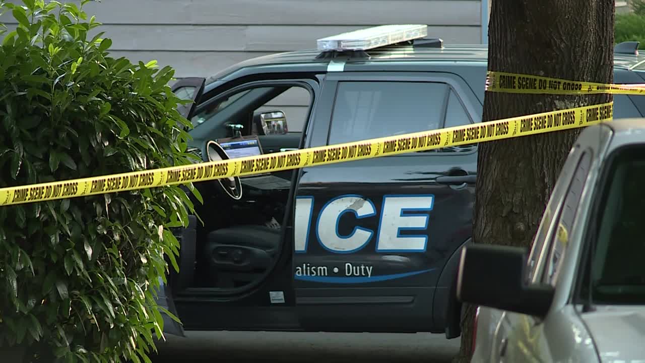 POLICE CAR DRIVER SIDE DOOR OPEN AT CRIME