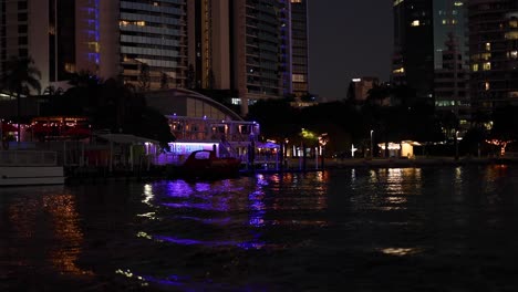 colorful reflections on water at night