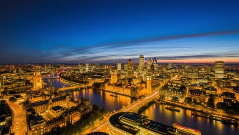 aerial view of london cityscape and river thames at dusk
