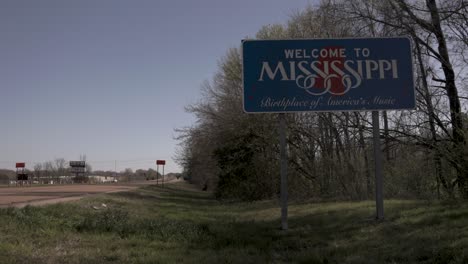 Welcome to Mississippi, birthplace of America&#039;s music, state line sign on the side of the freeway with stable video