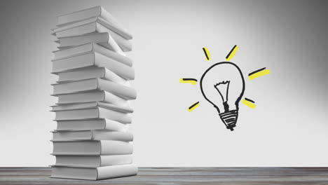 una pila de libros en blanco y una bombilla parpadeante