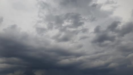 mid afternoon thunderstorm rain clouds forming and blending across the african horizon time lapse, noise free 4k footage