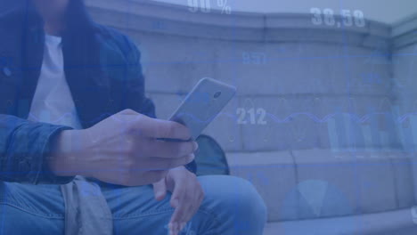 Animation-of-statistical-data-processing-over-biracial-man-using-smartphone-sitting-on-the-stairs