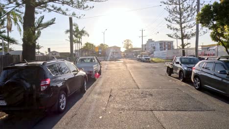 a scenic drive through a quiet neighborhood at sunset.