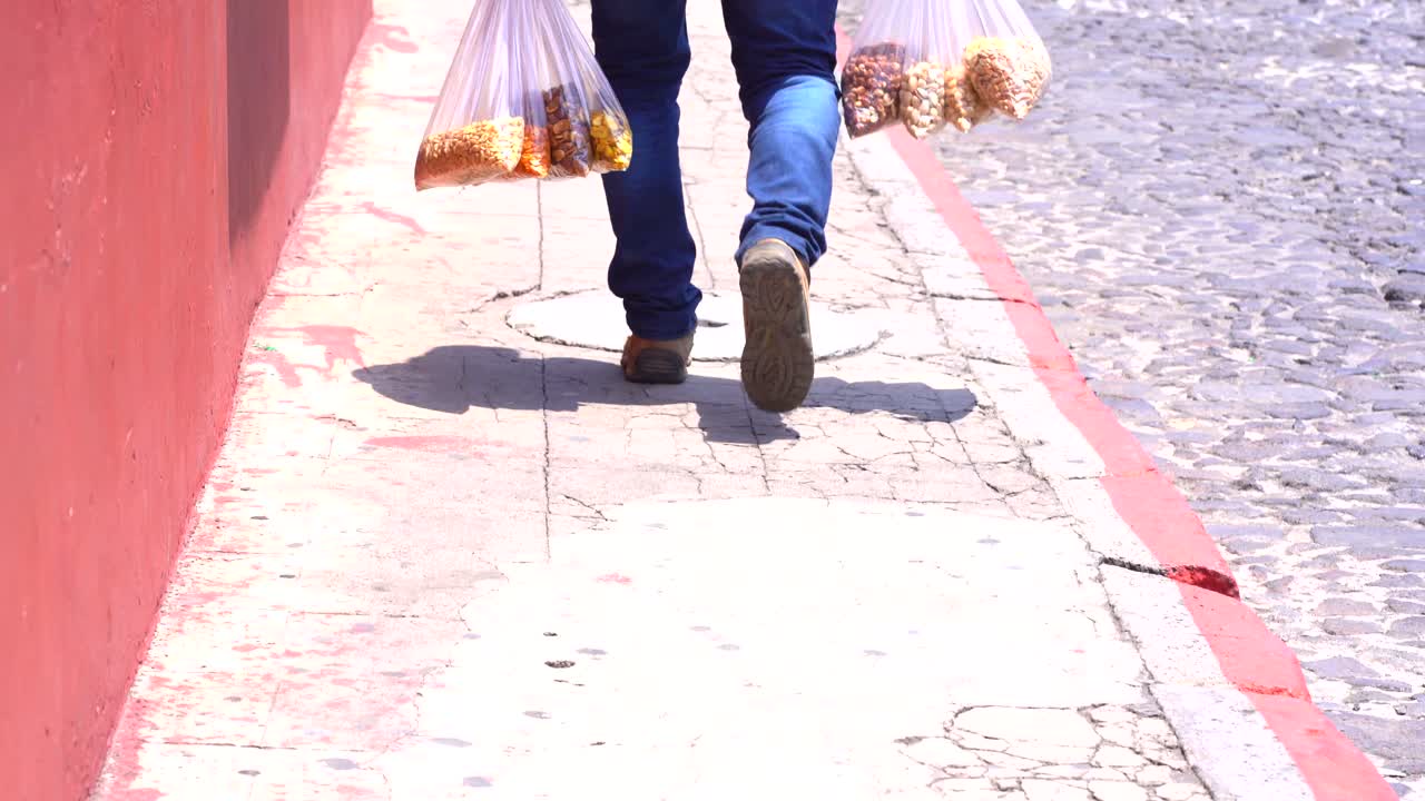 Peanut seller in Latin America. Food seller in Latin America