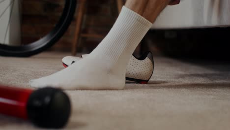 person getting ready for indoor cycling