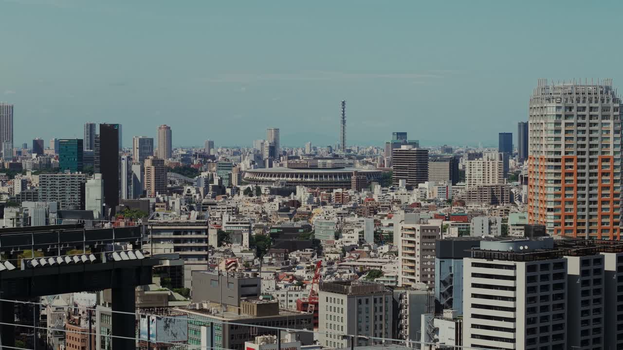 Tokyo Cityscape with Stadium and Green Rooftop