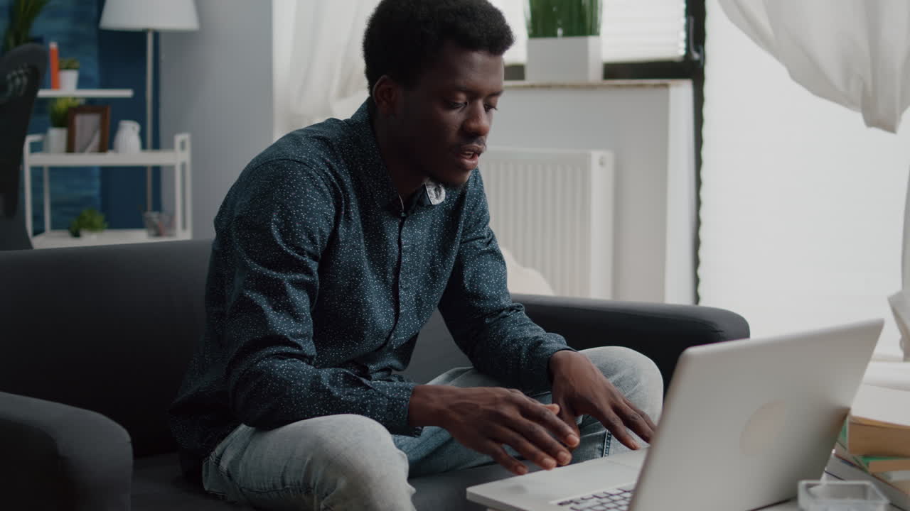 African american entrepreneur on remote video call from his living room