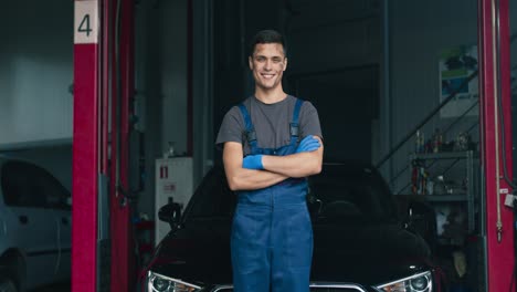 smiling mechanic in a garage